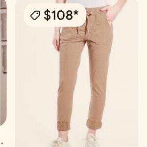 Made in Italy waist tie, stretch pants with pockets, and satin trim on the sides